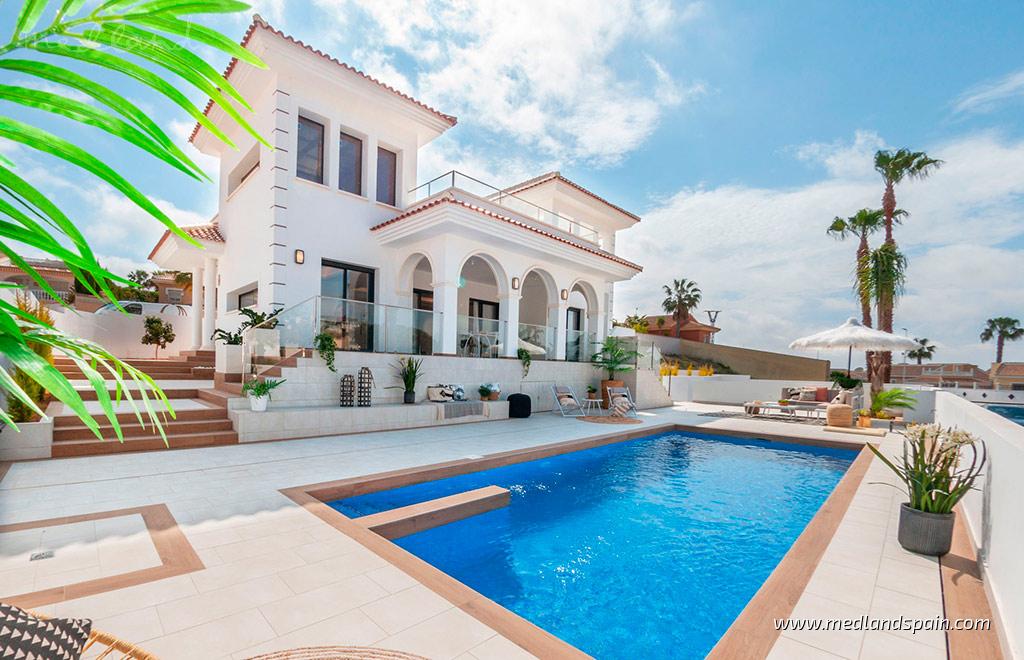KEY READY & FULLY FURNISHED! Spanish-style villa with 3 bedrooms and ...